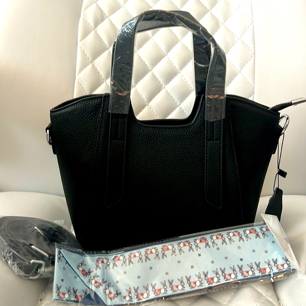 Black pebbled leather purse NWT. Silver hardware long adjustable strap scarf bow